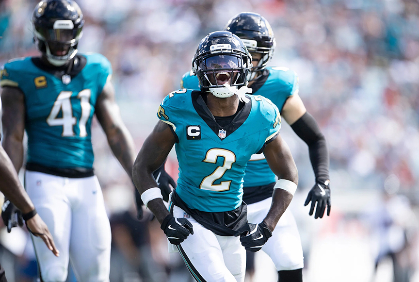 Jacksonville Jaguars players celebrating on the field